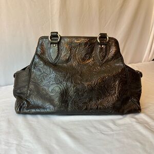 Black leather Donald Pliner floral engraving purse